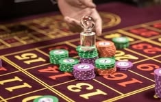 Cosmic Spins casino presented on mobile device in Pakistan with slots and live games